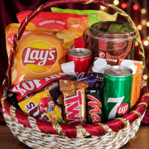 A premium snack and sweet gift basket filled with Lay's potato chips, chocolate bars, and sodas, perfect for gifting.