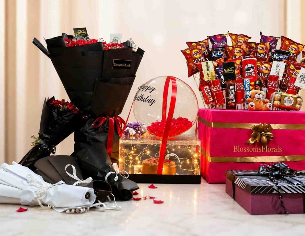 birthday gift hamper Pakistan with flowers and snacks