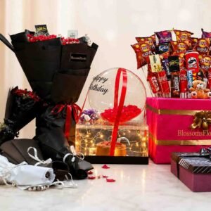 birthday gift hamper Pakistan with flowers and snacks