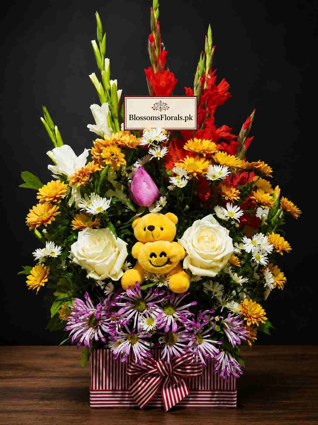 flower arrangement Pakistan with teddy bears and mixed flowers