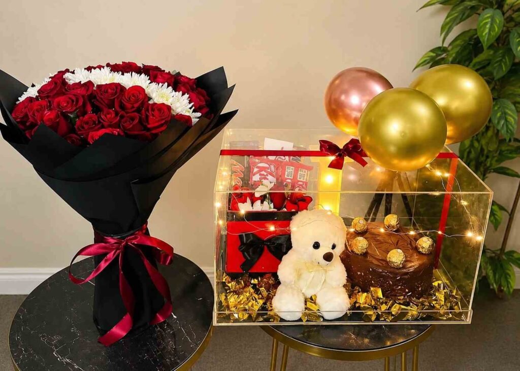 Anniversary gift box with red roses and chocolates