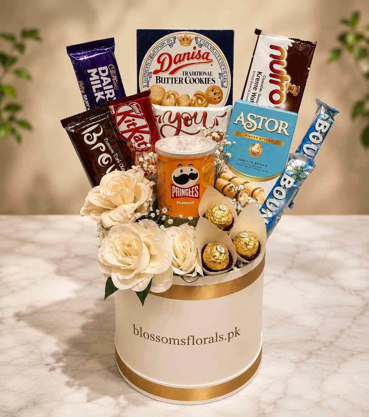 Flower Chocolate Gift Hamper with roses and assorted treats in Pakistan